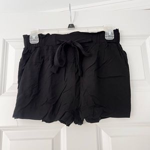 Black paper bag style shorts
